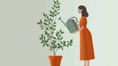 a woman watering the plant