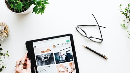 tablet and plants on a table